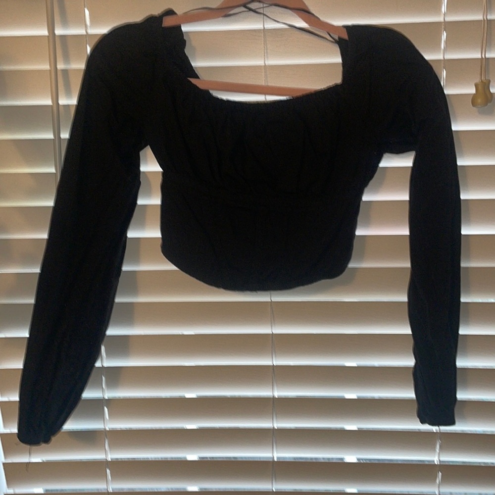small, black corseted crop top, long sleeve